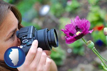 a female photographer photographing a flower close-up - with Illinois icon