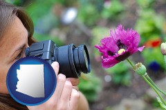 arizona map icon and a female photographer photographing a flower close-up