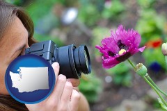 washington map icon and a female photographer photographing a flower close-up