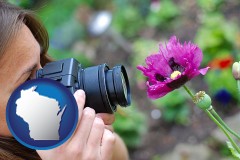 wisconsin map icon and a female photographer photographing a flower close-up